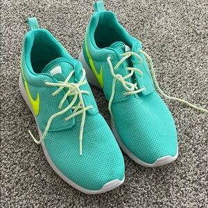 Nike Kids Teal Athletic Sneakers with Neon Yellow Swoosh
